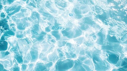 Fototapeta premium Abstract background of water ripples in swimming pool, light blue color