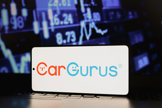 August 12, 2024, Paraguay. In this photo illustration, the CarGurus, Inc. logo is displayed on a smartphone screen.