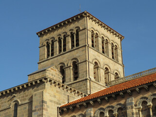 Abbey of Saint-Austremoine. 12th century. UNESCO World Heritage. View of the north facade and the bell tower. Historic city of Issoire. Auvergne. France. 