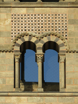 Romanesque Abbey of Saint-Austremoine. 12th century. UNESCO World Heritage. Detail of bifora window in the bell tower with horseshoe arches. Issoire. Auvergne. France.