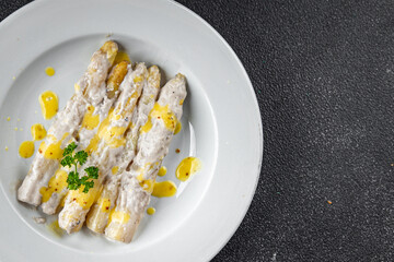 white asparagus in cream sauce fresh meal food snack on the table copy space food background rustic top view