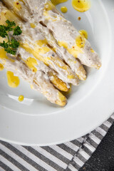 white asparagus in cream sauce fresh meal food snack on the table copy space food background rustic top view