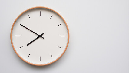 Minimalist wooden Wall Clock on White Wooden Surface with Space for Text – Time Set at 20.50/8.50