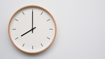Minimalist wooden Wall Clock on White Wooden Surface with Space for Text – Time Set at 20.00/8.00