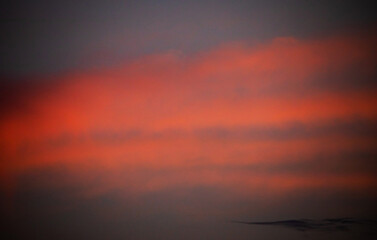 Abstract image created by the setting sun and clouds