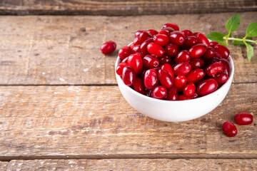 Cornelian cherry, dogwoods edible berry in white bowl