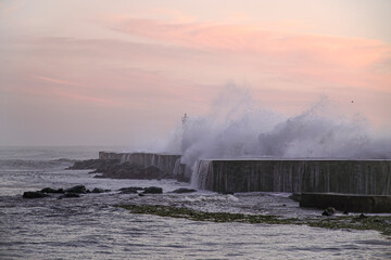 Sea storm at sunset