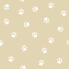 Cat little paws seamless pattern on beige background