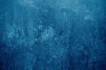 Grunge scratched blue wall texture background.