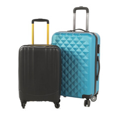 Two new light blue and black suitcases isolated on white