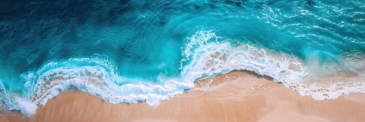 Beautiful sandy beach and soft blue ocean wave from top view