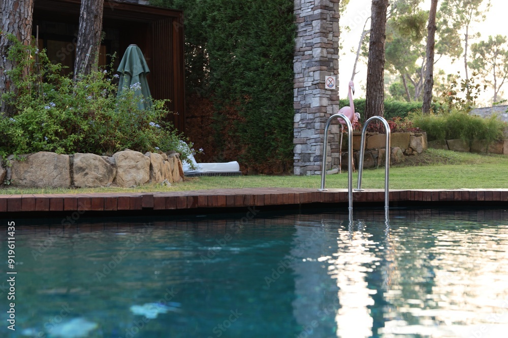 Canvas Prints Outdoor swimming pool with clear water at luxury resort