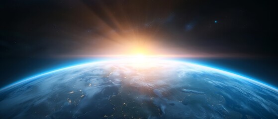 Fototapeta premium A perspective of Earth from space, as the sun rises above its horizon line