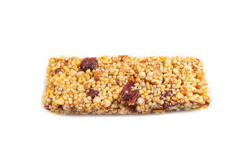 Granola bar with, caramel, nuts, flakes isolated on white. Side view, close up.