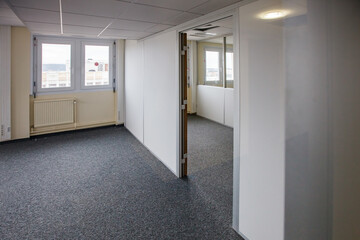 Survey of empty interior of administration office building, made in the 70s with materials...