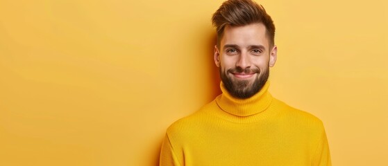 Obraz premium A bearded man in a yellow turtleneck smiles directly at the camera