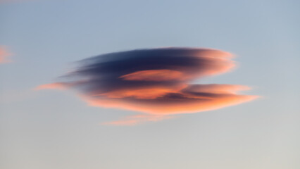 Unusual UFO like clouds in the evening sky