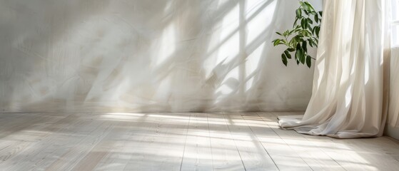  A white room featuring a plant in its corner and a white curtain adjacent