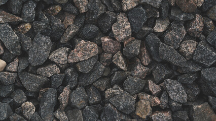 Stone path, view of the cobblestones from above. Background stones