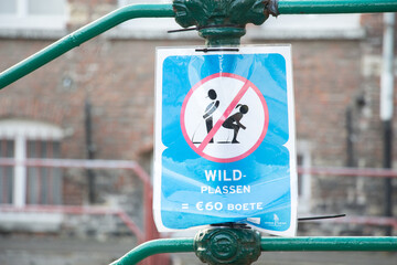 GHENT, BELGIUM - SEPTEMBER 22, 2014: Funny no pissing sign in Ghent