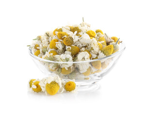 Chamomile flowers in glass bowl isolated on white