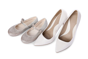 Big and small shoes isolated on white