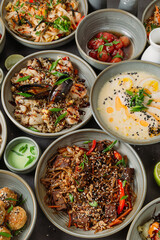 Bowls filled with various asian dishes presenting a culinary delights from japanese cuisine