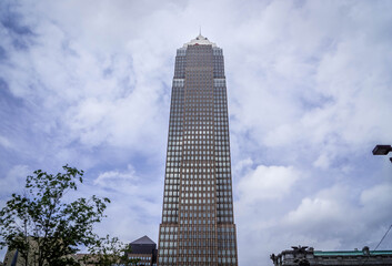 Key Tower, the tallest building in the state of Ohio, at Cleveland downtown, with the cloudy sky and glass facade.
