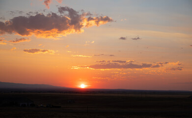 Red sunset with orange clouds in Wyoming 