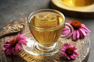 Echinacea tea in a glass cup on a table