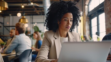 The woman working on laptop