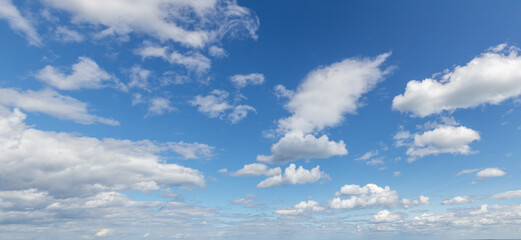 Sky replacement white and gray puffy clouds against blue skies