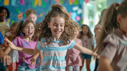 Fototapeta premium Children dancing happily together with teacher at nursery school