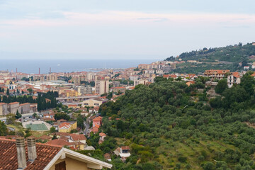 Fototapeta premium A Serene View of Coastal Italian Town With Verdant Hillsides
