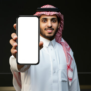 saudi man holding smart phone with his hand showing the screen to camera, Mockup a isolated for Infographic Business web site design app
