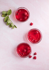 Healthy food. Raspberry jelly on white plate. Summer dessert with fruit jelly and fresh raspberry.