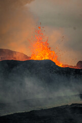 volcano in Grindavik erupting and lava magma flowing to the hills of iceland