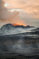volcano in Grindavik erupting and lava magma flowing to the hills of iceland