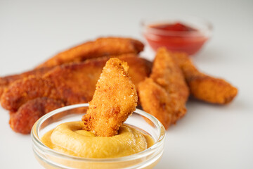 Crispy Chicken Strips with Spicy Mustard and Ketchup Sauces