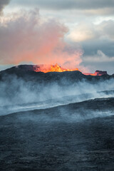 volcano in Grindavik erupting and lava magma flowing to the hills of iceland