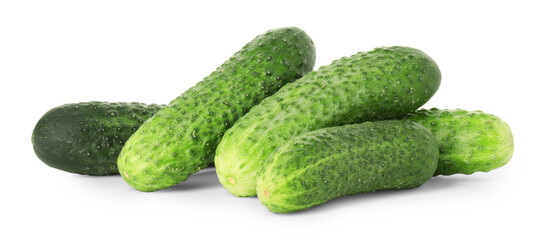 Pile of whole fresh cucumbers isolated on white