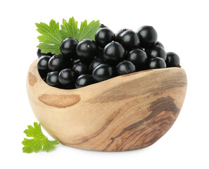 Fresh ripe black currant berries with leaves isolated on white