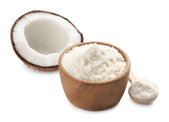 Fresh coconut flour in bowl, spoon and nut isolated on white