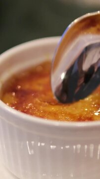 Vanilla cream with burnt sugar on top, dessert. Creme brulee in Catalan style