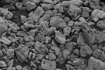 Pebble rocks background at Hersonissos beach, Crete Island, Greece