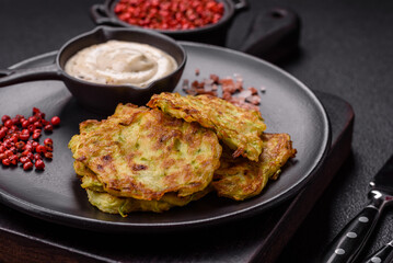 Vegetable zucchini fritters with garlic, salt, spices and herbs