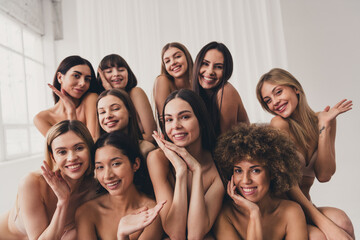 Photo of group sisterhood in lingerie waving palms sending greetings to onlyfans followers over...