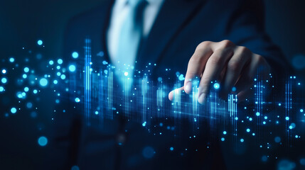 Futuristic interface: A business professional interacts with a dynamic digital interface, highlighting modern technology's integration into decision-making and analytics.