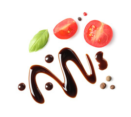 Delicious balsamic vinegar, cut tomatoes, basil and peppercorns isolated on white, top view