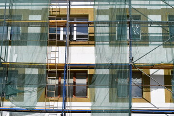 Insulating and repair works on the appartment house. Improving energy efficiency. Selective focus. 